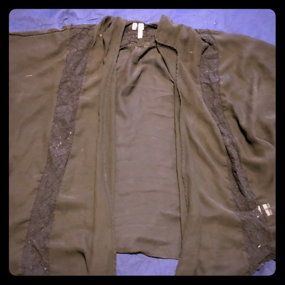 Sheer black shawl with lace pattern